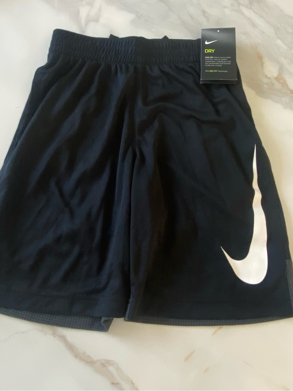 Nike Black Athletic Shorts with White Swoosh and Neon Yellow Tag